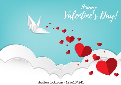 Red hearts falling from paper origami bird on blue sky with clouds and Happy Valentine's Day! text. Concept of love and valentine day in paper art style for background, advertising and promotion. 