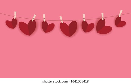 Red hearts hanging with paper clips on a rope. Valentine's Day. Vector illustration. Greeting card with empty space. 
Paper art and digital craft style red hearts on pink background.