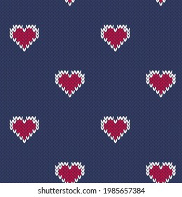 Red hearts knitted seamless pattern on navy blue background. Vector illustration.