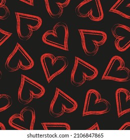 Red hearts on a black background. Seamless background. Design paper or fabric for Valentine's day.