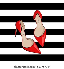 Red heel shoes on black and white striped background.