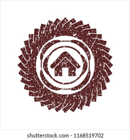 Red home icon inside grunge seal