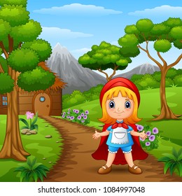 Red hooded girl are in the village at forest