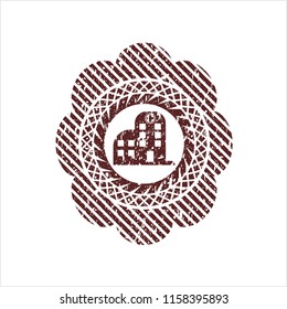 Red hospital icon inside rubber texture