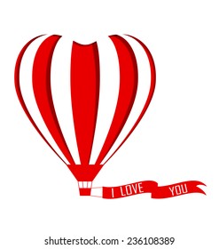 Red hot air balloon in the shape of a heart cutout with declaration of love on white background