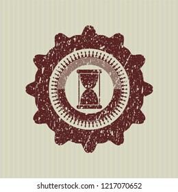 Red hourglass icon inside distressed grunge stamp