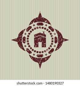 Red house icon inside rubber stamp with grunge texture