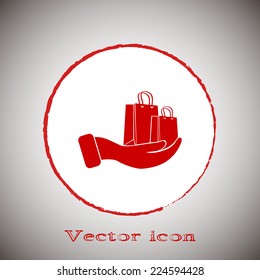  Red icon on a gray background. Vector illustration of shopping bags