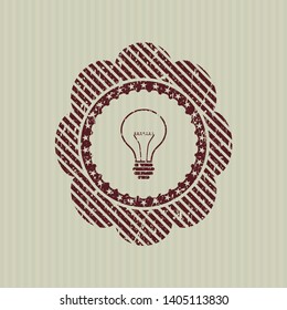 Red idea icon inside distress rubber grunge texture stamp
