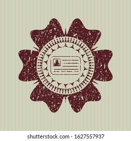Red identification card icon inside distressed rubber seal with grunge texture