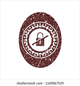 Red inaccessible icon inside rubber seal with grunge texture
