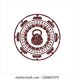 Red kettlebell icon inside distressed rubber grunge seal