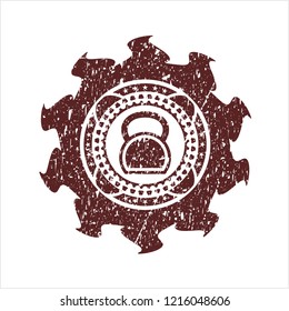 Red kettlebell icon inside distressed grunge stamp