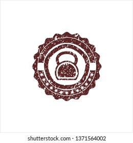 Red kettlebell icon inside distressed rubber stamp