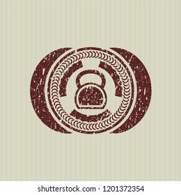 Red kettlebell icon inside grunge stamp