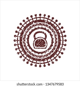 Red kettlebell icon inside rubber grunge texture seal