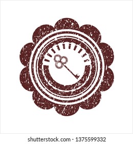 Red key icon inside distress rubber grunge stamp