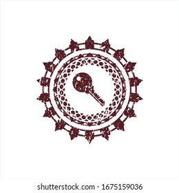 Red key icon inside distressed with rubber seal texture