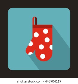 Red kitchen glove with white dots icon in flat style on a light blue background