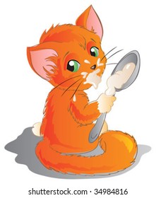 Red kitten with spoon