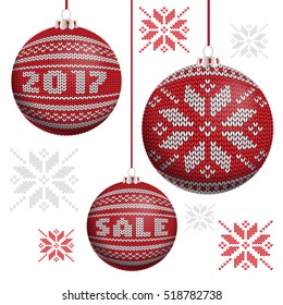 Red knitted Christmas balls with snowflake, word sale and 2017