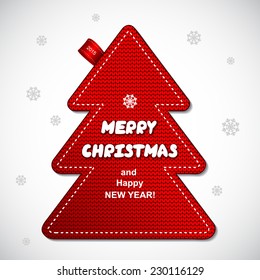 Red knitted Christmas pine tree label can be used as a greeting card