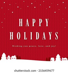 red knitted fabric background with snowy city