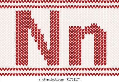 Red knitted Letter n on beige Background. Christmas concept for banner, placard, billboard or web site. New Year retro greeting card and background. Image for invitation