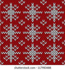 red knitted pattern of snowflakes