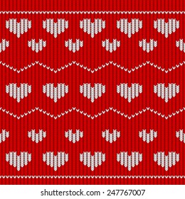 Red knitted seamless pattern with hearts. Vector illustration