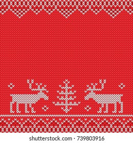 Red knitted sweater with deer knitted pattern