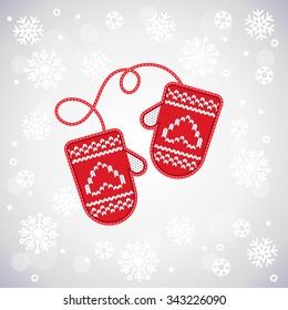 Red knitted vector mittens with rope. Christmas and New Year card template. Winter background with snowflakes and bokeh.