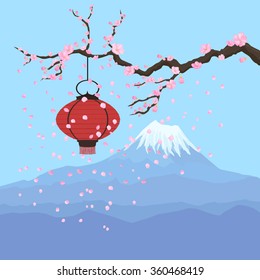 Red lantern hanging on a sakura branch in front of Fuji mountain