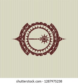 Red laser icon inside distress rubber stamp
