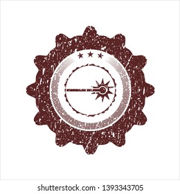 Red laser icon inside distress rubber seal