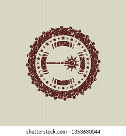 Red laser icon inside rubber seal with grunge texture