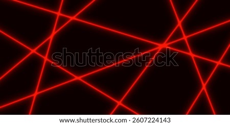 Red laser shines across the line on the dark background.
