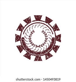 Red leaf crown icon inside distressed rubber grunge texture seal