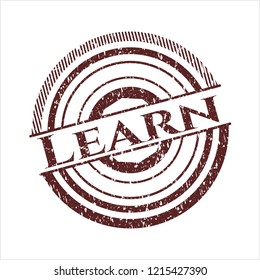 Red Learn distressed rubber stamp with grunge texture