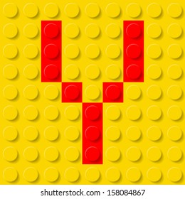 Red letter Y in yellow plastic construction kit. Typeface  sample.