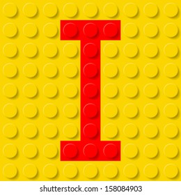 Red letter I in yellow plastic construction kit. Typeface  sample.