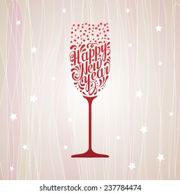 red lettering happy new year in the form of a glass of champagne on a white background