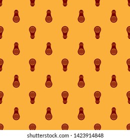 Red Light bulb with inside world globe icon isolated seamless pattern on brown background. Planet Earth on the lamp. Global ecology concept. Vector Illustration