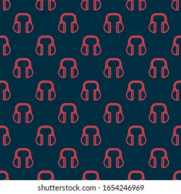 Red line Headphones icon isolated seamless pattern on black background. Earphones. Concept for listening to music, service, communication and operator.  Vector Illustration