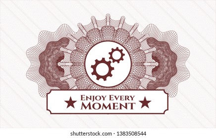 Red linear rosette with gear, team work icon and Enjoy Every Moment text inside