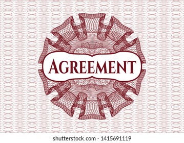 Red linear rosette with text Agreement inside