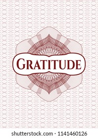 Red linear rosette with text Gratitude inside
