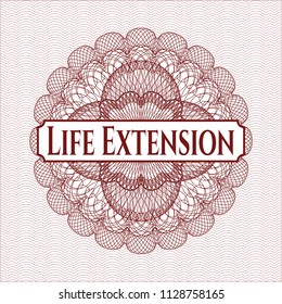 Red linear rosette with text Life Extension inside