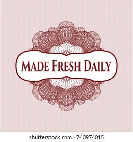 Red linear rosette with text Made Fresh Daily inside