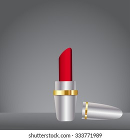 Red lipstick stand on the dark grey with spot light wallpaper, Concept for Fashion or cosmetic